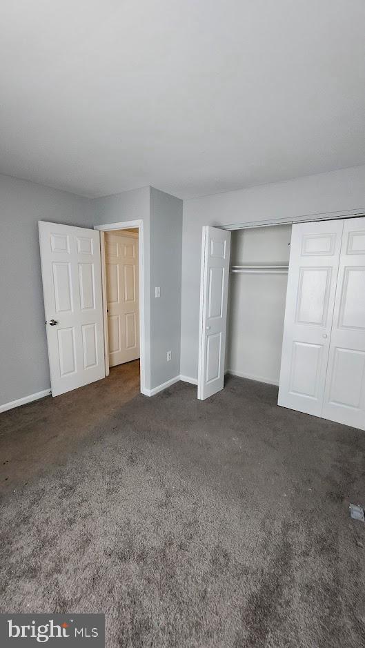 1756 Forest Park Dr, District Heights, MD 20747 - unfurnished bedroom with carpet and a closet