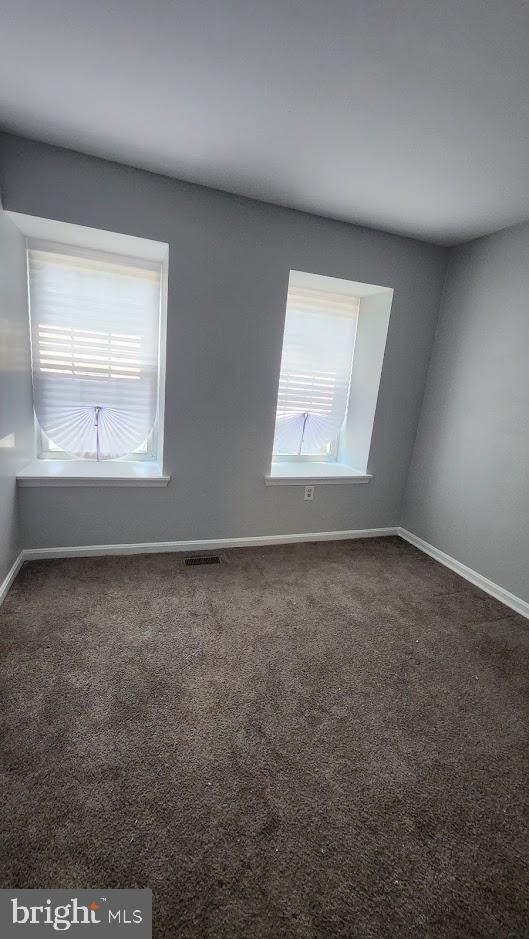 1756 Forest Park Dr, District Heights, MD 20747 - carpeted empty room featuring baseboards