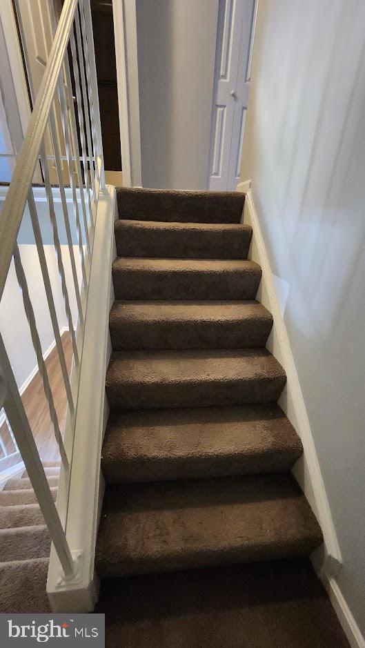 1756 Forest Park Dr, District Heights, MD 20747 - stairs featuring baseboards