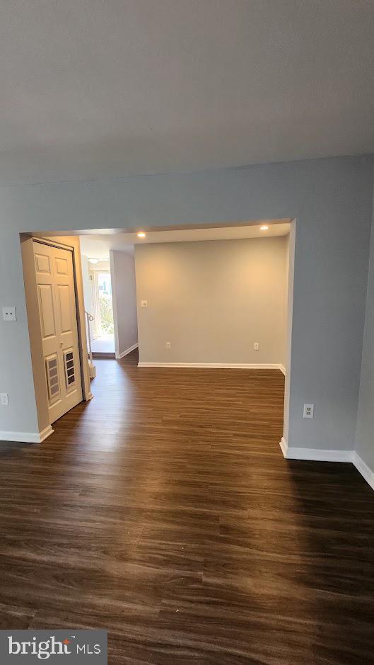 1756 Forest Park Dr, District Heights, MD 20747 - empty room with dark wood-style floors and recessed lighting
