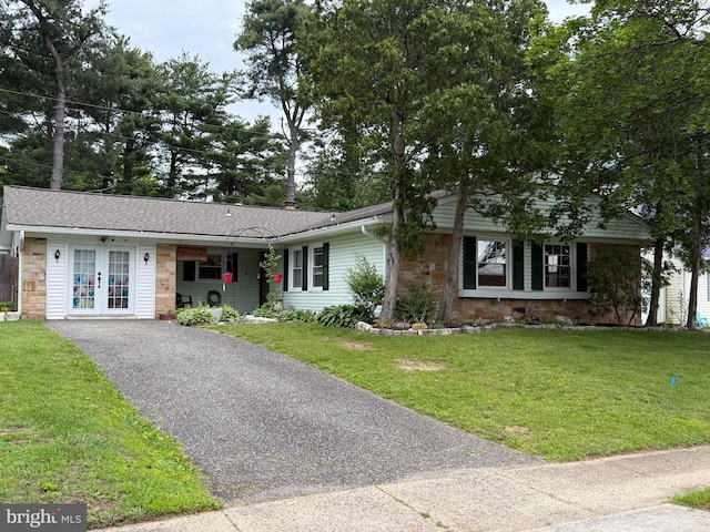 52 Henderson Ln, Willingboro, NJ 08046 - ranch-style home featuring stone siding, a front lawn, and asphalt driveway