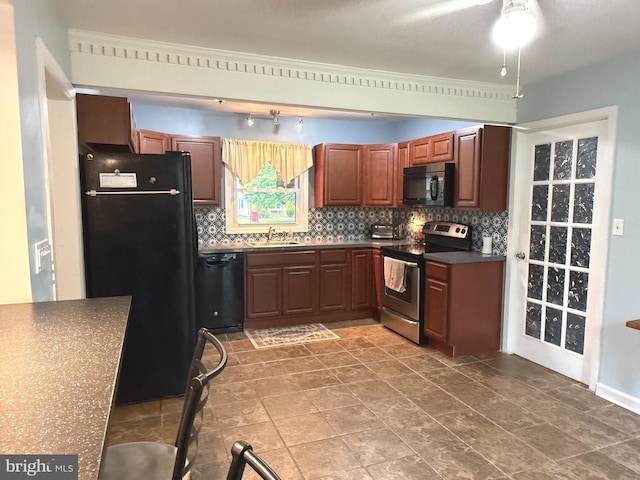 52 Henderson Ln, Willingboro, NJ 08046 - kitchen with black appliances, dark countertops, tasteful backsplash, and a ceiling fan