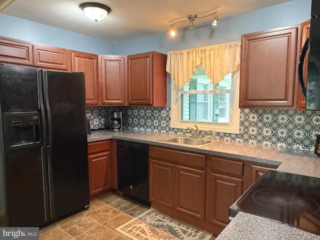 52 Henderson Ln, Willingboro, NJ 08046 - kitchen featuring black appliances, tasteful backsplash, and brown cabinetry