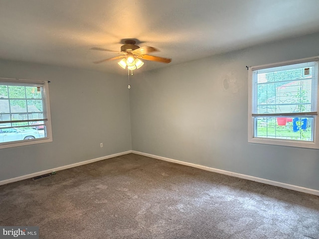 52 Henderson Ln, Willingboro, NJ 08046 - unfurnished room with plenty of natural light, dark carpet, and ceiling fan