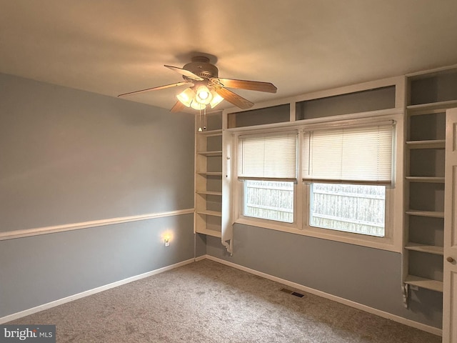 52 Henderson Ln, Willingboro, NJ 08046 - carpeted empty room featuring ceiling fan and plenty of natural light