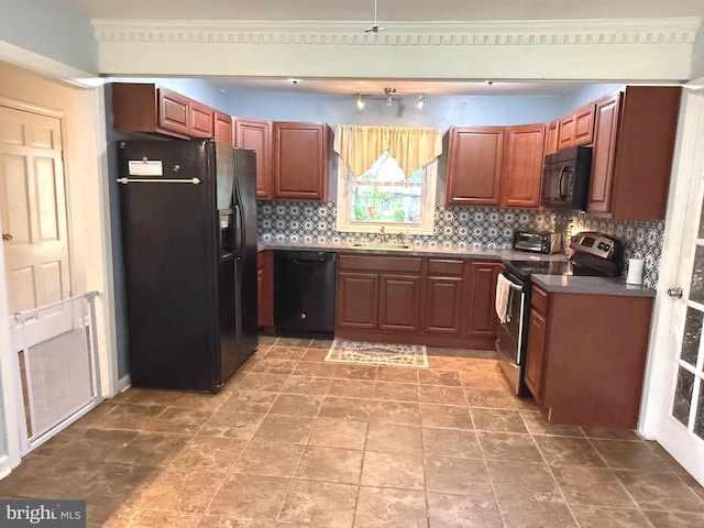 52 Henderson Ln, Willingboro, NJ 08046 - kitchen with black appliances, dark countertops, backsplash, and brown cabinetry