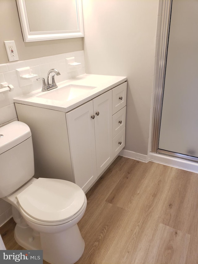 760 Princeton Pl Unit 1-760, Rockville, MD 20850 - bathroom with vanity, wood finished floors, and a shower stall