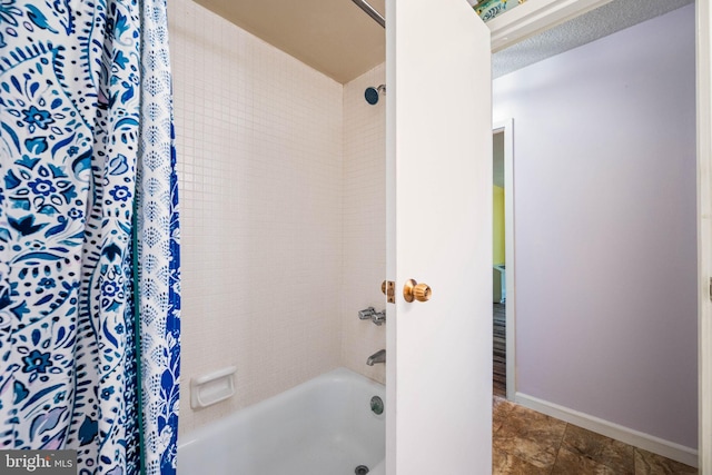 801 Yale Ave Unit 827, Swarthmore, PA 19081 - full bathroom featuring shower / bath combo with shower curtain and tile patterned flooring