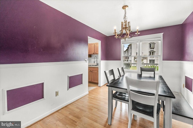 606 Knightsbridge Dr, Hagerstown, MD 21740 - dining area featuring a chandelier and light wood-style flooring