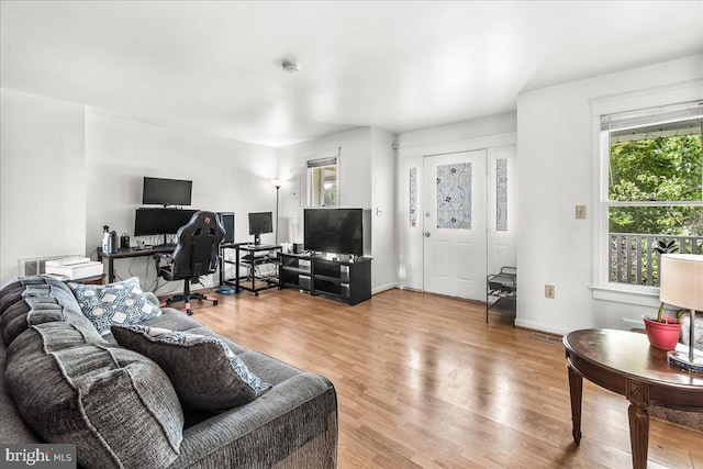 606 Knightsbridge Dr, Hagerstown, MD 21740 - living room featuring plenty of natural light, wood finished floors, and a desk