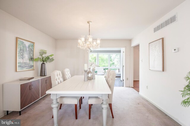 505 Country Pointe Cir, Perkasie, PA 18944 - dining space with a chandelier and carpet floors