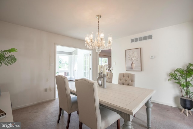 505 Country Pointe Cir, Perkasie, PA 18944 - carpeted dining room featuring a chandelier and baseboards