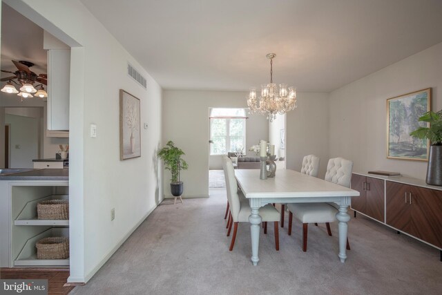 505 Country Pointe Cir, Perkasie, PA 18944 - dining area with a chandelier, a ceiling fan, and light colored carpet