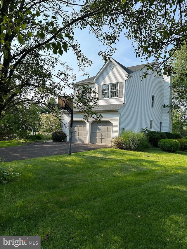 505 Country Pointe Cir, Perkasie, PA 18944 - view of front of home featuring an attached garage, a front yard, and asphalt driveway