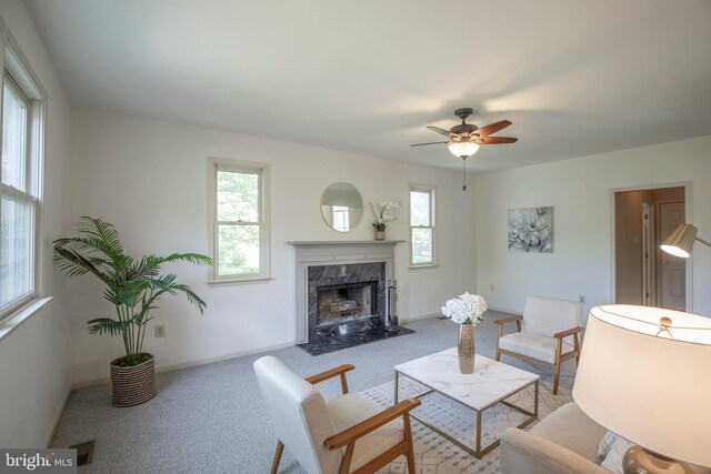 505 Country Pointe Cir, Perkasie, PA 18944 - carpeted living area featuring a fireplace and ceiling fan