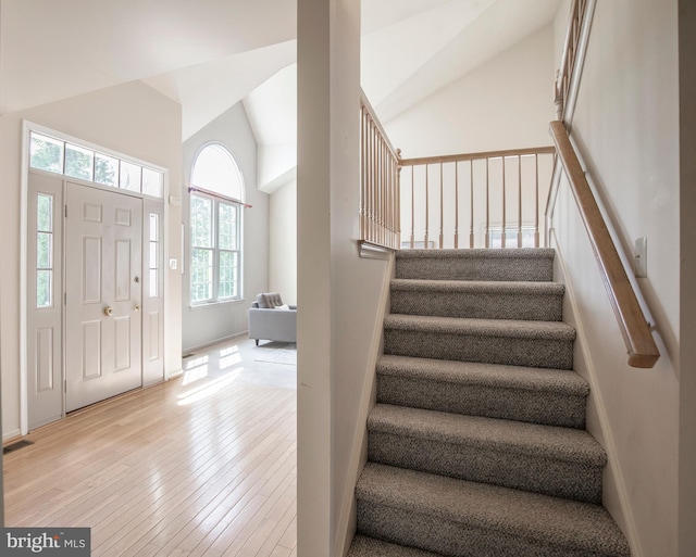 505 Country Pointe Cir, Perkasie, PA 18944 - entryway featuring stairs, hardwood / wood-style flooring, and high vaulted ceiling