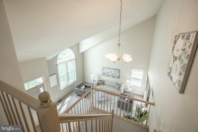 505 Country Pointe Cir, Perkasie, PA 18944 - stairs with carpet, a chandelier, and high vaulted ceiling