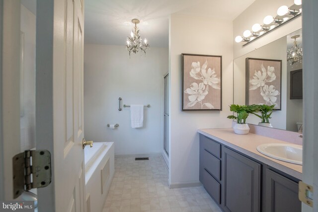 505 Country Pointe Cir, Perkasie, PA 18944 - bathroom featuring vanity, a chandelier, a stall shower, and a garden tub