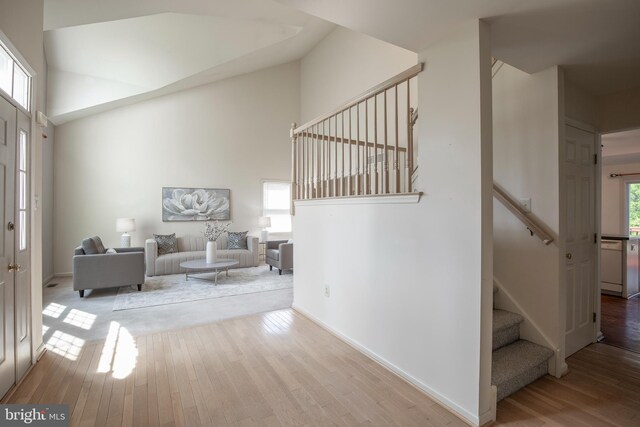 505 Country Pointe Cir, Perkasie, PA 18944 - entryway with stairway, wood finished floors, and a towering ceiling