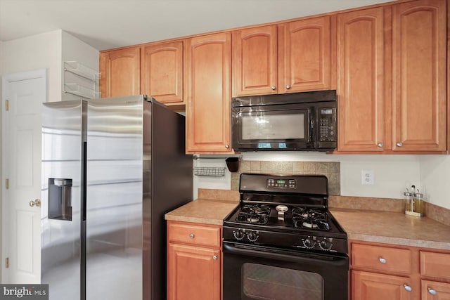 2044 Astilbe Way Unit 2044, Odenton, MD 21113 - kitchen with black appliances, light countertops, and backsplash