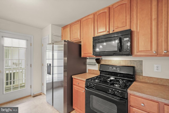2044 Astilbe Way Unit 2044, Odenton, MD 21113 - kitchen featuring black appliances and light countertops