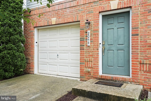 2044 Astilbe Way Unit 2044, Odenton, MD 21113 - property entrance with brick siding and a garage