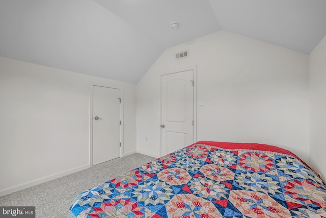 9434 Winchester Ave, Bunker Hill, WV 25413 - carpeted bedroom featuring vaulted ceiling and baseboards