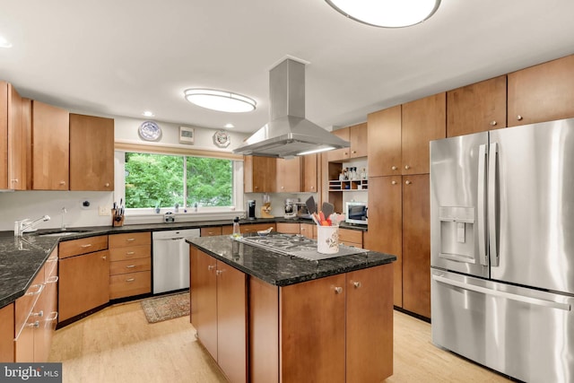 10135 Spring Pools Ln, Columbia, MD 21044 - kitchen featuring appliances with stainless steel finishes, island exhaust hood, light wood-style floors, a kitchen island, and recessed lighting