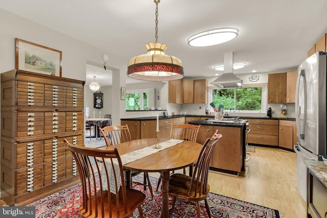 10135 Spring Pools Ln, Columbia, MD 21044 - dining area with light wood finished floors and plenty of natural light
