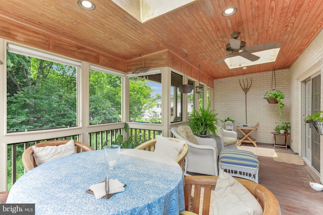10135 Spring Pools Ln, Columbia, MD 21044 - sunroom featuring outdoor dining space, a ceiling fan, and a skylight