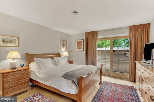 10135 Spring Pools Ln, Columbia, MD 21044 - bedroom with access to outside and light wood-style flooring