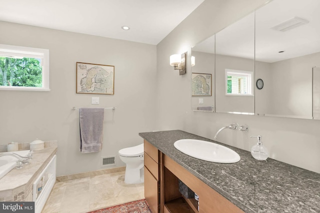 10135 Spring Pools Ln, Columbia, MD 21044 - bathroom with healthy amount of natural light, vanity, and a bathtub