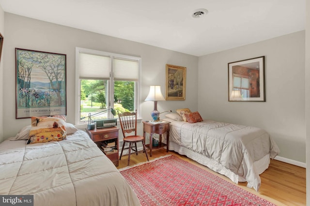 10135 Spring Pools Ln, Columbia, MD 21044 - bedroom with wood finished floors