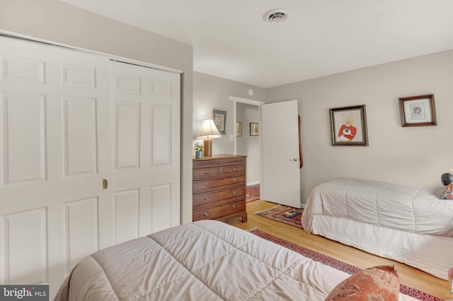 10135 Spring Pools Ln, Columbia, MD 21044 - bedroom with wood finished floors and a closet