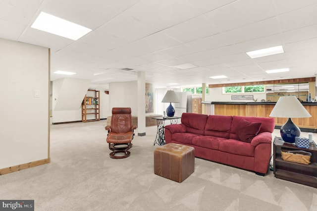 10135 Spring Pools Ln, Columbia, MD 21044 - carpeted living area with baseboards and a paneled ceiling