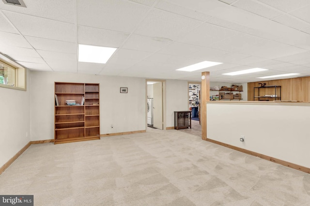 10135 Spring Pools Ln, Columbia, MD 21044 - finished basement with a paneled ceiling and light colored carpet