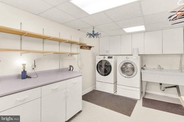 10135 Spring Pools Ln, Columbia, MD 21044 - laundry area with cabinet space and separate washer and dryer