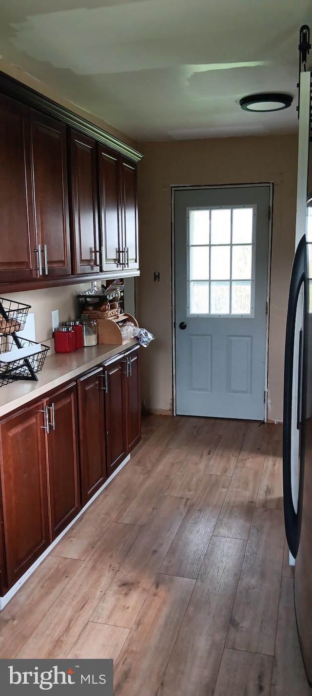 106 Center St, Manns Choice, PA 15550 - washroom with cabinet space and light wood finished floors