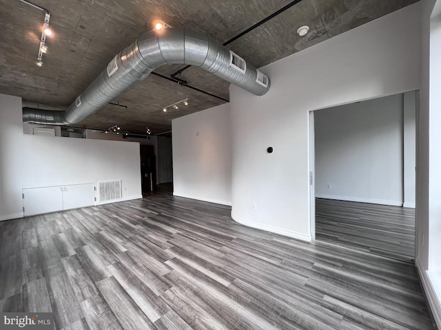 301 Massachusetts Ave NW Unit 301, Washington, DC 20001 - empty room with wood finished floors and rail lighting