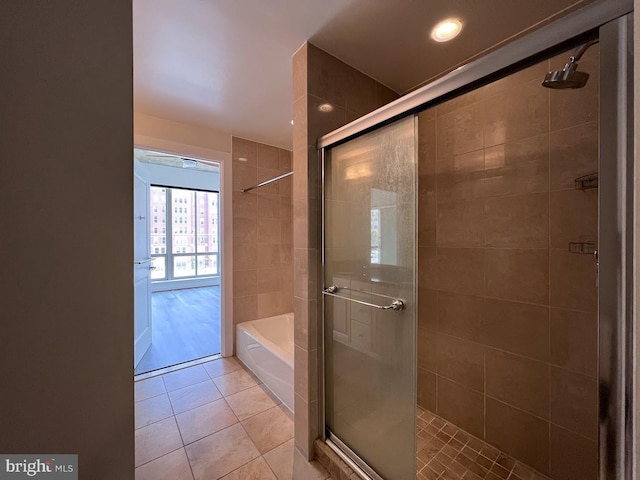 301 Massachusetts Ave NW Unit 301, Washington, DC 20001 - full bathroom with a shower stall, tile patterned flooring, and a garden tub