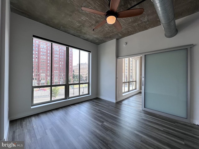 301 Massachusetts Ave NW Unit 301, Washington, DC 20001 - empty room with wood finished floors and a ceiling fan