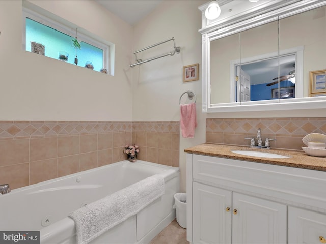 2528 Papoose Dr, Auburn, PA 17922 - bathroom with a whirlpool tub, vanity, and backsplash