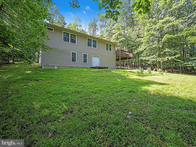 2528 Papoose Dr, Auburn, PA 17922 - rear view of house featuring a yard and a wooden deck