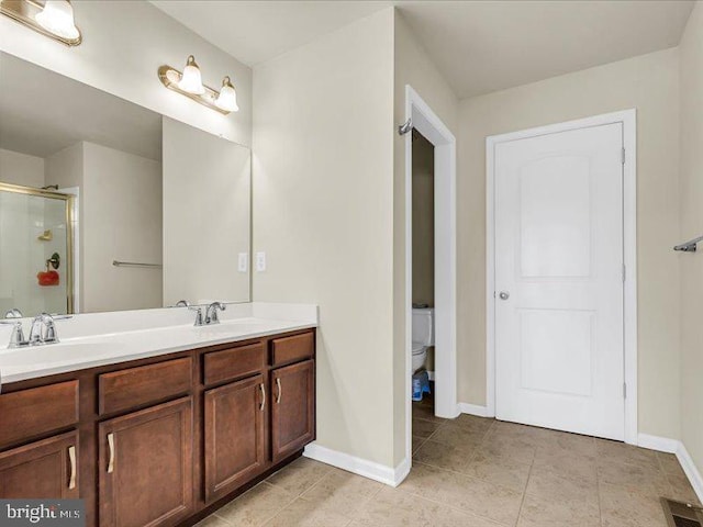 44 Munro Rd, Newark, DE 19711 - full bathroom featuring double vanity, a stall shower, and tile patterned flooring