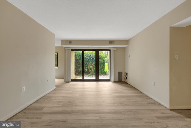 615 Center St Unit T3, Herndon, VA 20170 - empty room featuring light wood-style flooring and baseboards