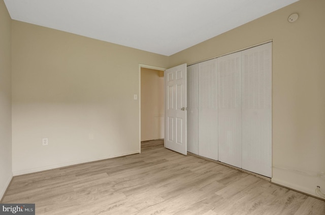 615 Center St Unit T3, Herndon, VA 20170 - unfurnished bedroom featuring wood finished floors and a closet