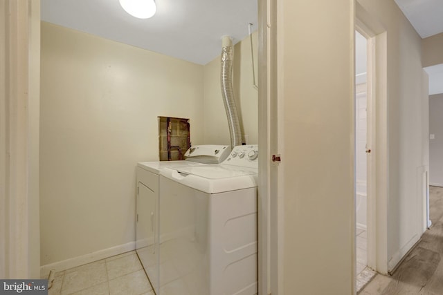 615 Center St Unit T3, Herndon, VA 20170 - laundry area with washer and clothes dryer and baseboards
