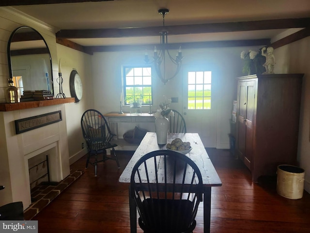 2569 White Oak Rd, Strasburg, PA 17579 - dining space featuring dark wood-style flooring, a glass covered fireplace, and a chandelier