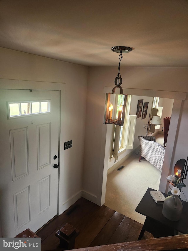 2569 White Oak Rd, Strasburg, PA 17579 - foyer with dark wood-style floors and baseboards