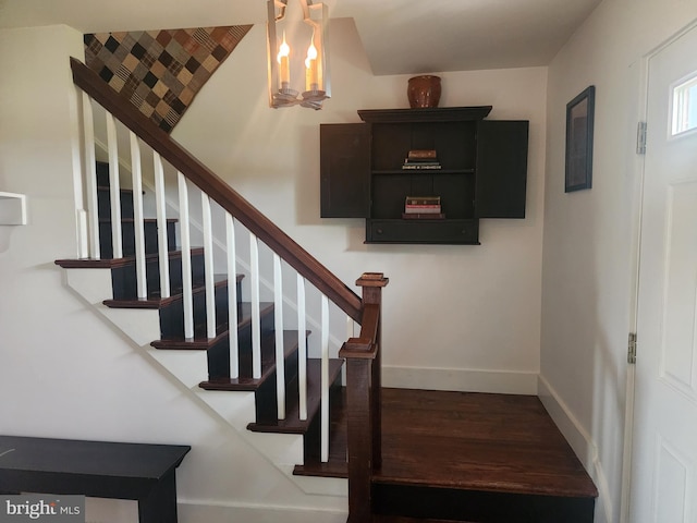 2569 White Oak Rd, Strasburg, PA 17579 - stairs featuring wood finished floors and baseboards